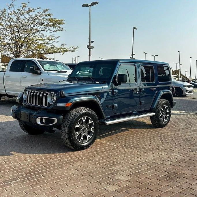 Used Jeep Wrangler IV (JL) Facelift, 3.6 l, 2025 in Sharjah by Golden Desert Used Car, Navy Blue color. Other | AUTO.AE