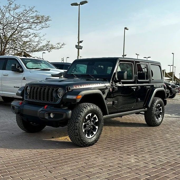 Used Jeep Wrangler IV (JL) Facelift, 3.6 l, 2025 in Sharjah by Golden Desert Used Car, Black color. Canadian Specs | AUTO.AE