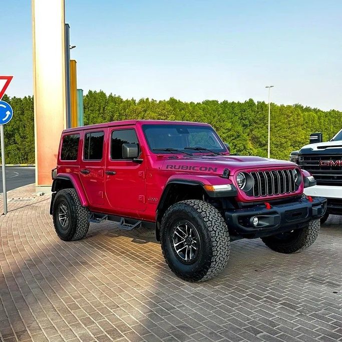 Used Jeep Wrangler IV (JL) Facelift, 3.6 l, 2024 in Sharjah by Golden Desert Used Car, Pink color. Other | AUTO.AE