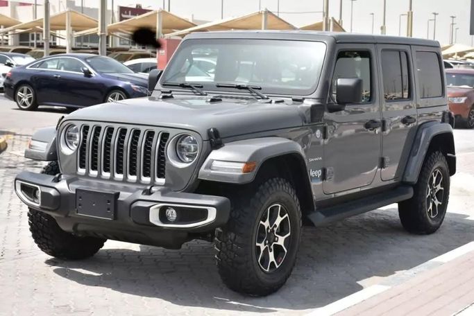 Подержанный Jeep Wrangler IV (JL), 2.0 л, 2021 в Шардже от Alfaris Used Cars Серый цвет. Other | AUTO.AE