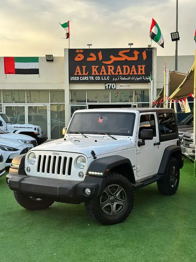 مستعملة Jeep Wrangler III (JK), 3.6 l, 2014 في في الشارقة من AL KARADAH USED CARS TRADING، اللون أبيض. مواصفات الخليج | AUTO.AE