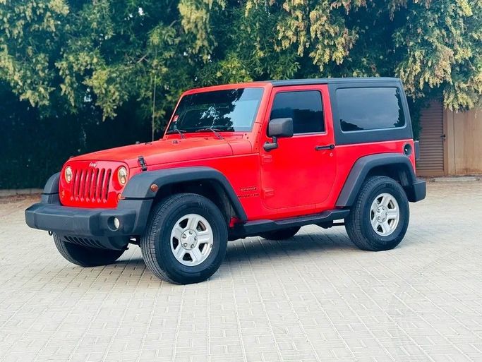 مستعملة Jeep Wrangler III (JK), 3.8 l, 2013 في في الشارقة من Bashar Karoomi Kunani، اللون أحمر. مواصفات الخليج | AUTO.AE