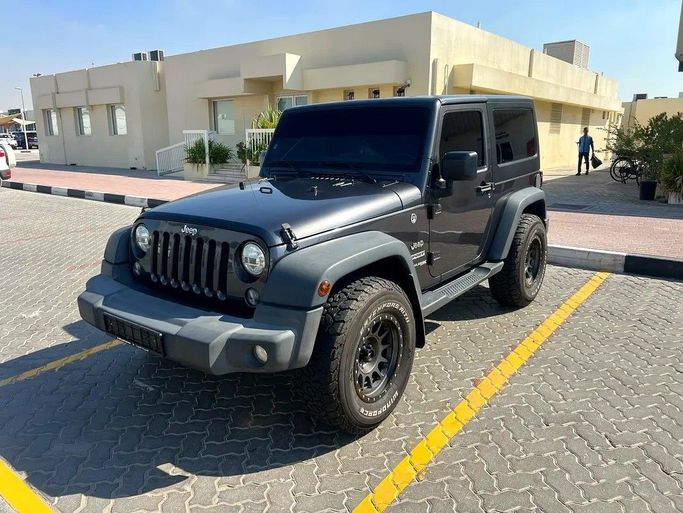 Подержанный Jeep Wrangler IV (JL), 2.0 л, 2018 в Шардже от Bashar Karoomi Kunani Черный цвет. GCC | AUTO.AE