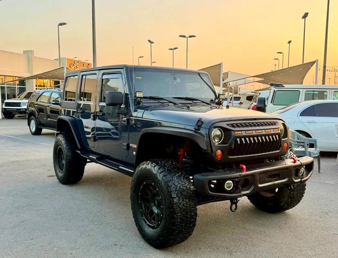 Подержанный Jeep Wrangler III (JK), 3.6 л, 2016 в Шардже от Black Wheel Used Cars Черный цвет. GCC | AUTO.AE