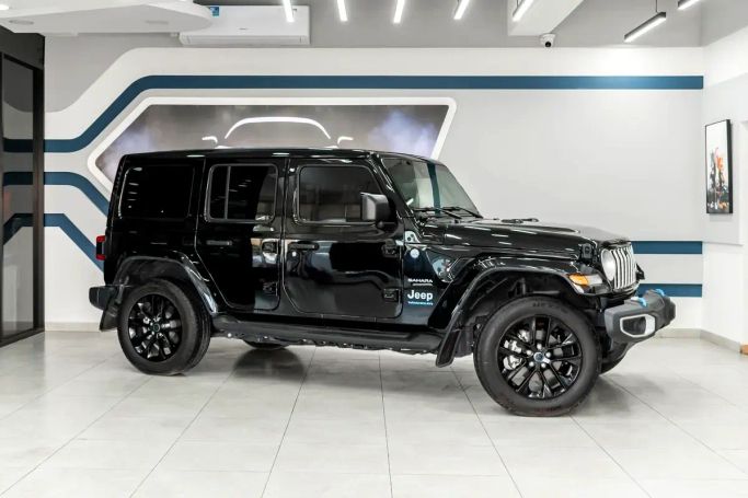 Used Jeep Wrangler IV (JL) Facelift, 2.0 l, 2024 in Sharjah by Golden Desert Used Car, Black color.  | AUTO.AE | Listing #263192