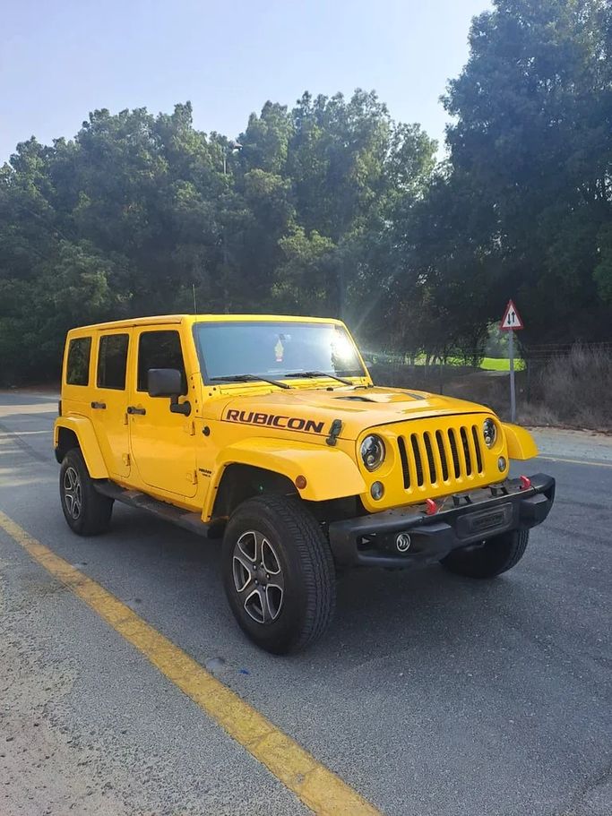 مستعملة Jeep Wrangler III (JK), 3.8 l, 2015 في في الإمارات, الشارقة من Imad Younis Almani used Cars، اللون أصفر. مواصفات الخليج | AUTO.AE | إعلان #277834