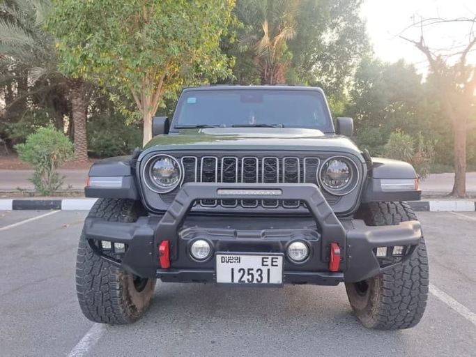 Подержанный ⁦Jeep Wrangler IV (JL), 2.0 л, 2020⁩ в ОАЭ, Шарджа от Wahat Al Umra Used Cars Зеленый цвет. Канадская | AUTO.AE | Объявление #289523