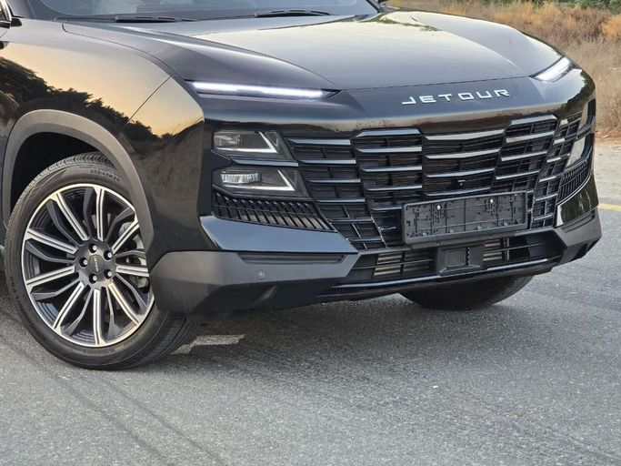 Подержанный Jetour Dashing I, 1.6 л, 2024 в Шардже от Al Jana Used Cars Черный цвет. Китайская | AUTO.AE