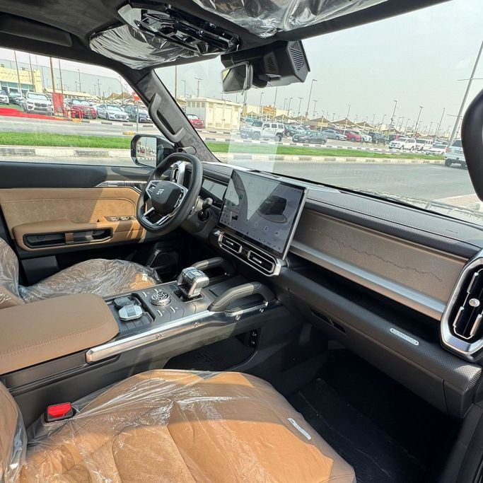 Новый Jetour T2, 2.0 л, 2025 в Шардже от Alfaris Used Cars Черный цвет.  | AUTO.AE