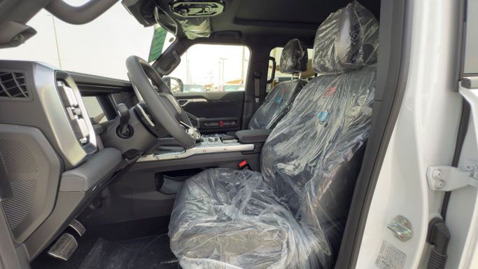 Новый Jetour T2, 2.0 л, 2025 в Шардже от Badar Used Cars Белый цвет.  | AUTO.AE