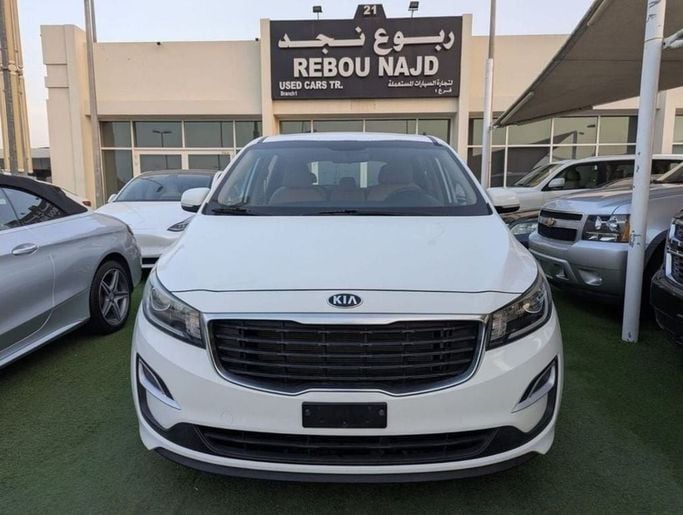 Used Kia Carnival III, 3.3 l, 2020 in Sharjah by Rebou Najd Used Cars, White color. GCC Specs | AUTO.AE