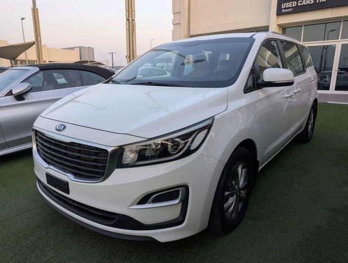 Used Kia Carnival III, 3.3 l, 2020 in Sharjah by Rebou Najd Used Cars, White color. GCC Specs | AUTO.AE