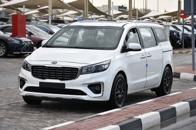 Used Kia Carnival III, 2.2 l, 2020 in Sharjah by Alfaris Used Cars, White color. Other | AUTO.AE