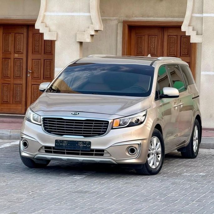 Used Kia Carnival III, 3.3 l, 2016 in Sharjah by Sarmad Cars, Golden color. GCC Specs | AUTO.AE