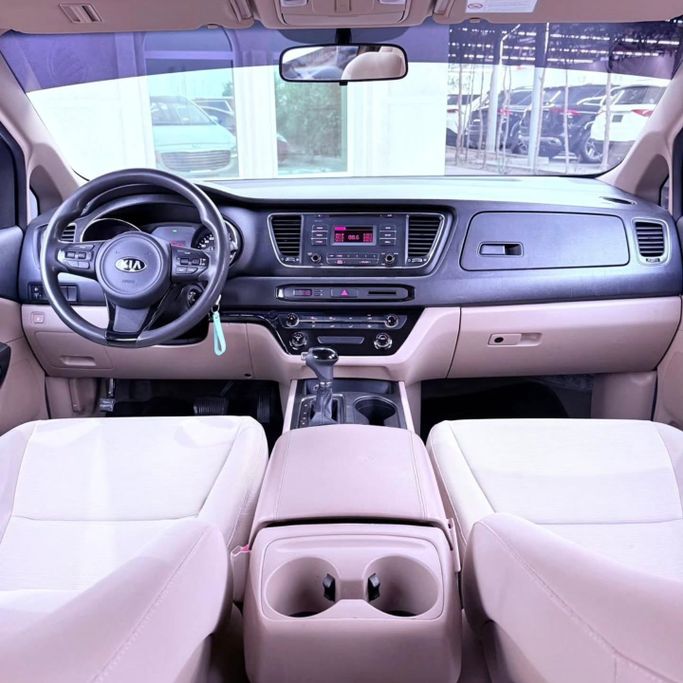 Used Kia Carnival III, 3.3 l, 2016 in Sharjah by Sarmad Cars, Golden color. GCC Specs | AUTO.AE
