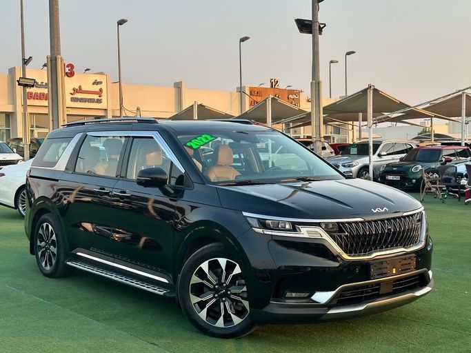 Подержанный Kia Carnival IV, 2.2 л, 2022 в Шардже от Badar Used Cars Черный цвет.  | AUTO.AE