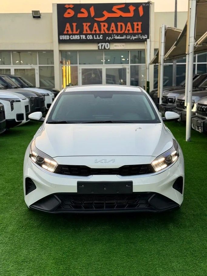 Used Kia K3 II Facelift, 1.6 l, 2023 in Sharjah by Almasar Used Cars, White color. Korean Specs | AUTO.AE