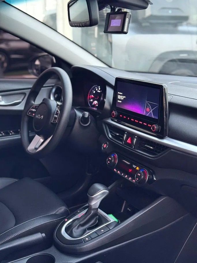 Used Kia K3 II Facelift, 1.6 l, 2023 in Sharjah by Almasar Used Cars, White color. Korean Specs | AUTO.AE