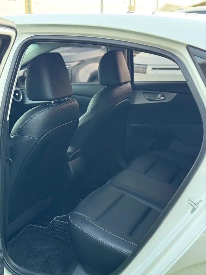 Used Kia K3 II Facelift, 1.6 l, 2023 in Sharjah by Almasar Used Cars, White color. Korean Specs | AUTO.AE