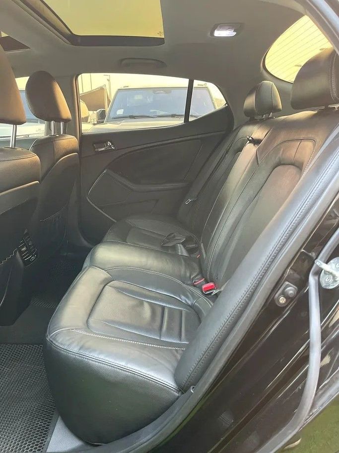 Used Kia K5 I, 2.0 l, 2012 in Sharjah by Almasar Used Cars, Black color. Korean Specs | AUTO.AE