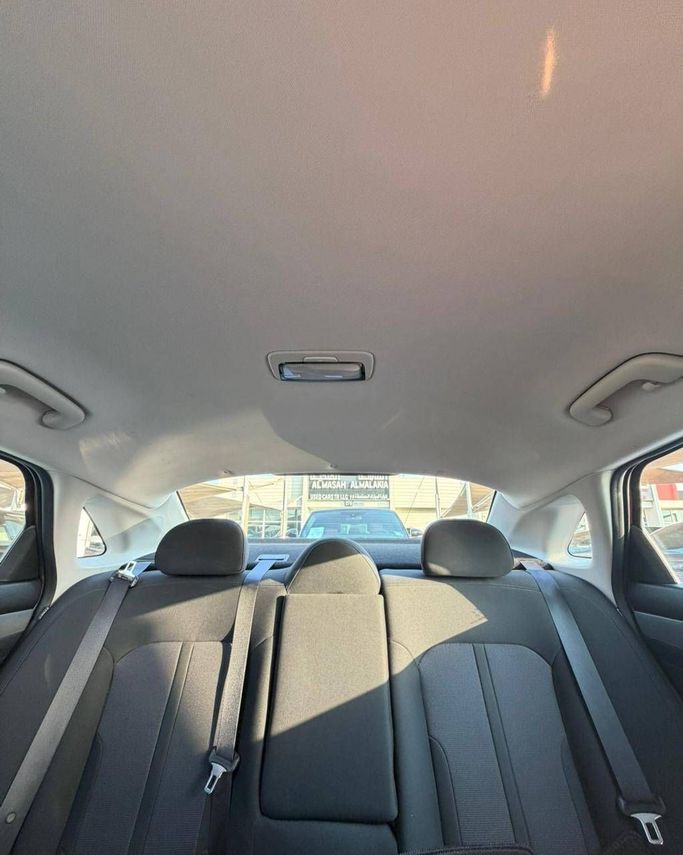 Used Kia K5 III, 1.6 l, 2021 in Sharjah by Al Masah Al Malakia, Red color. American Specs | AUTO.AE