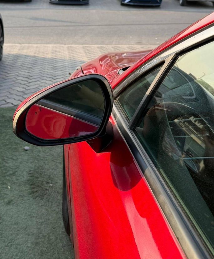 Used Kia K5 III, 1.6 l, 2021 in Sharjah by Al Masah Al Malakia, Red color. American Specs | AUTO.AE