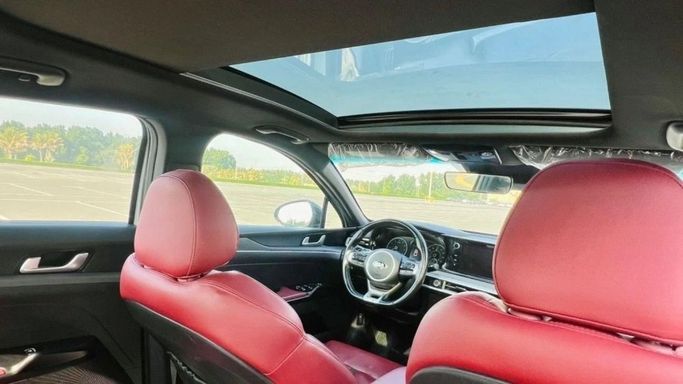 Подержанный Kia K5 III, 1.6 л, 2021 в Шардже от Halla Cars Серый цвет. Американская | AUTO.AE