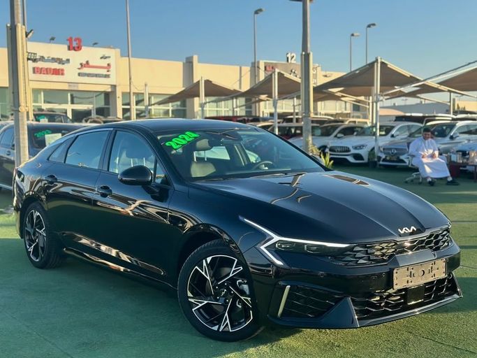Подержанный Kia K5 III Рестайлинг, 2.0 л, 2024 в Шардже от Badar Used Cars Черный цвет.  | AUTO.AE