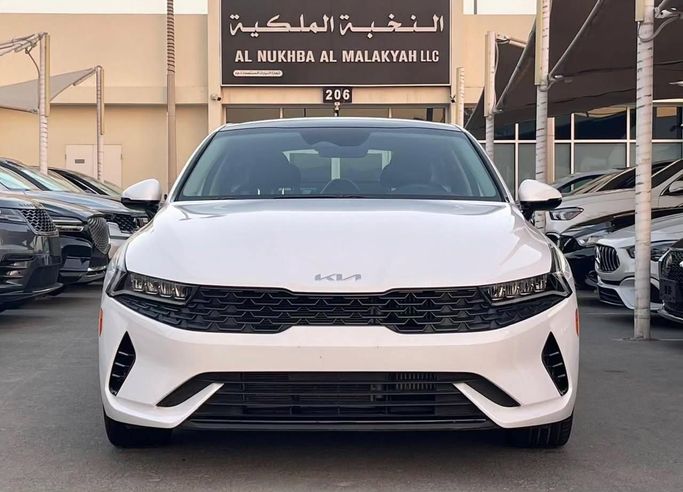 Used Kia K5 III, 1.6 l, 2024 in Sharjah by Al Nukhba Al Malakyah Used Cars, White color. American Specs | AUTO.AE