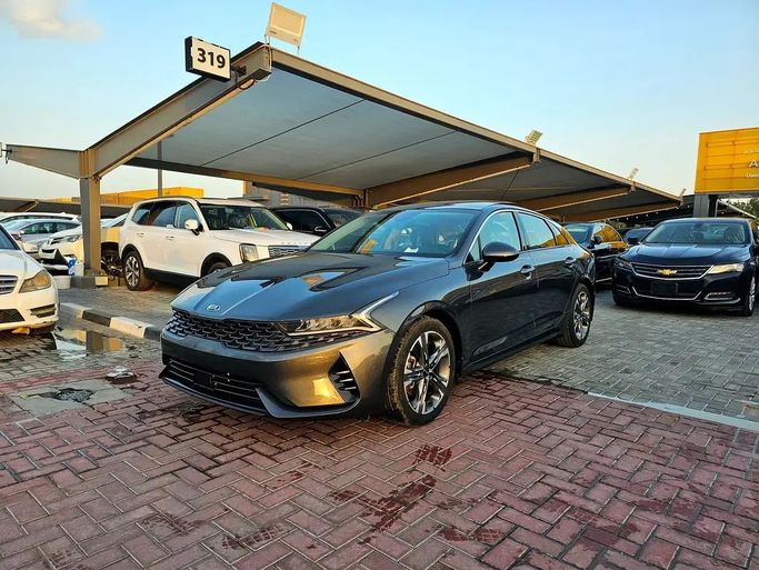 Used Kia K5 III, 1.6 l, 2021 in Sharjah by Al Hedou Used Cars, Grey color. Canadian Specs | AUTO.AE