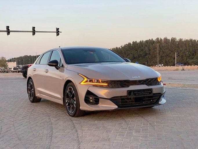 Used Kia K5 III, 2.5 l, 2023 in Sharjah by Wahat Al Sharq  Car Showroom, Grey color. American Specs | AUTO.AE