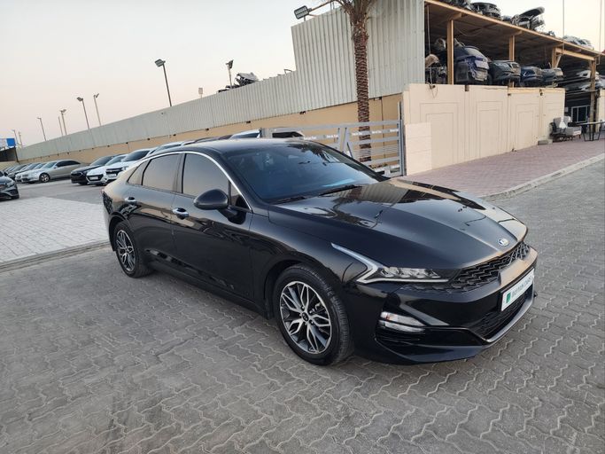 Подержанный Kia K5 III, 2.0 л, 2020 в Шардже от DAYYAN CARS Черный цвет. Корейская | AUTO.AE