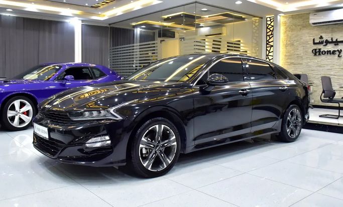 Подержанный Kia K5 III, 1.6 л, 2023 в Шардже от Honey Jidosha Used Cars Tr. Черный цвет. GCC | AUTO.AE | Объявление #273370