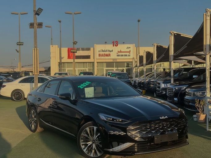 Used Kia K8 I, 2.5 l, 2024 in Sharjah by Badar Used Cars, Black color.  | AUTO.AE