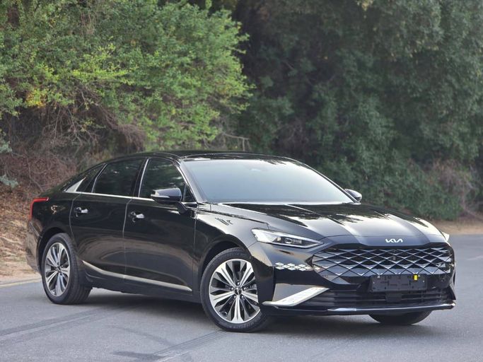 Подержанный Kia K8 I, 1.6 л, 2024 в Шардже от Al Jana Used Cars Черный цвет. Корейская | AUTO.AE