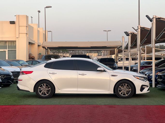 New Kia Optima IV Facelift, 2.0 l, 2020 in Sharjah by Lamer Motors, White color. American Specs | AUTO.AE