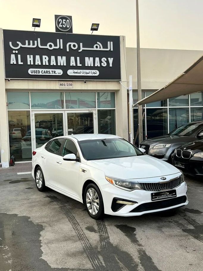 Used Kia Optima IV Facelift, 2.0 l, 2018 in Sharjah by Al Haram Al Masy, White color. American Specs | AUTO.AE
