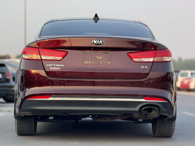 Used Kia Optima IV, 2.4 l, 2017 in Sharjah by Najmat Almajarah Motors, Maroon color. American Specs | AUTO.AE