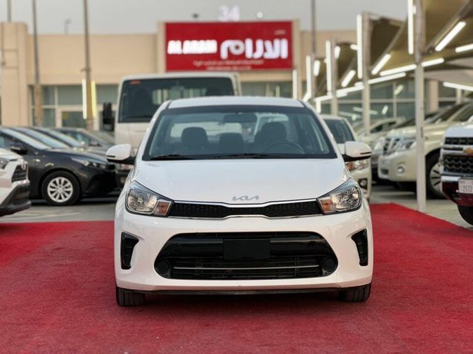 Новый Kia Pegas, 1.4 л, 2023 в Шардже от Al Aram Cars Белый цвет. GCC | AUTO.AE