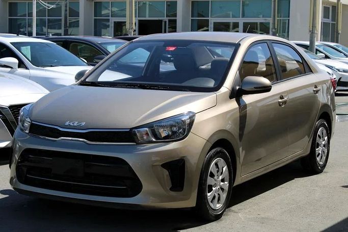 New Kia Pegas, 1.4 l, 2023 in Sharjah by Sama alsaadah Cars, Golden color. GCC Specs | AUTO.AE