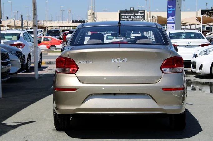 New Kia Pegas, 1.4 l, 2023 in Sharjah by Sama alsaadah Cars, Golden color. GCC Specs | AUTO.AE
