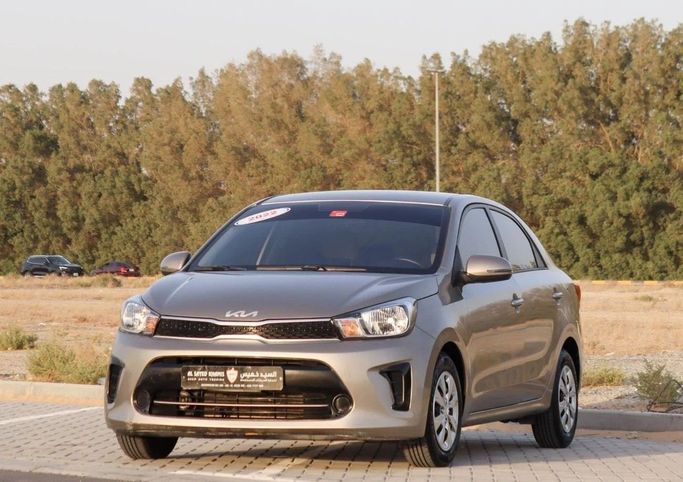 Подержанный Kia Pegas, 1.4 л, 2022 в Шардже от Al Sayed Khamis Used Auto Trading Коричневый цвет. GCC | AUTO.AE