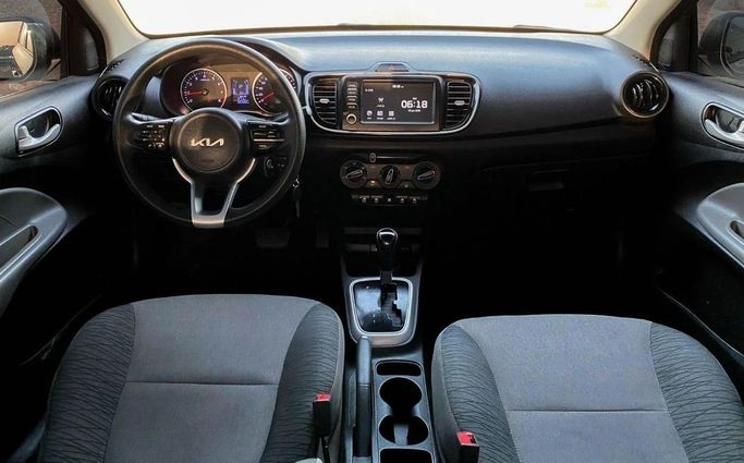 Подержанный Kia Pegas, 1.4 л, 2022 в Шардже от Al Sayed Khamis Used Auto Trading Коричневый цвет. GCC | AUTO.AE