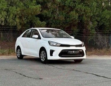 Подержанный Kia Pegas, 1.4 л, 2024 в ОАЭ, Шарджа от Al Sayed Khamis Used Cars Белый цвет. GCC | AUTO.AE | Объявление #275116