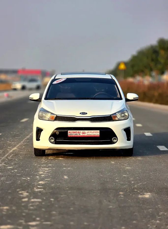 Подержанный ⁦Kia Pegas, 1.4 л, 2021⁩ в ОАЭ, Шарджа от Ali Gad Ali Used Cars Белый цвет. GCC | AUTO.AE | Объявление #291077
