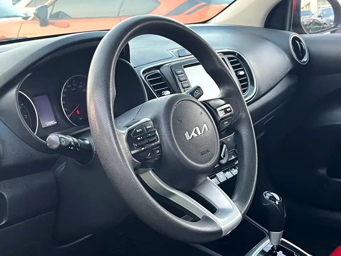 Used Kia Pegas, 1.4 l, 2023 in UAE, Sharjah by Rebou Alfakhama, Red color. GCC Specs | AUTO.AE | Listing #295809 — photo 10 of 11