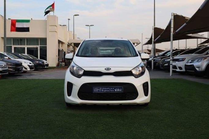 Подержанный Kia Picanto III, 1.2 л, 2020 в Шардже от OMC Used Cars Белый цвет. GCC | AUTO.AE