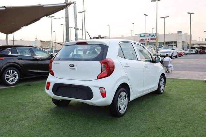 Подержанный Kia Picanto III, 1.2 л, 2020 в Шардже от OMC Used Cars Белый цвет. GCC | AUTO.AE