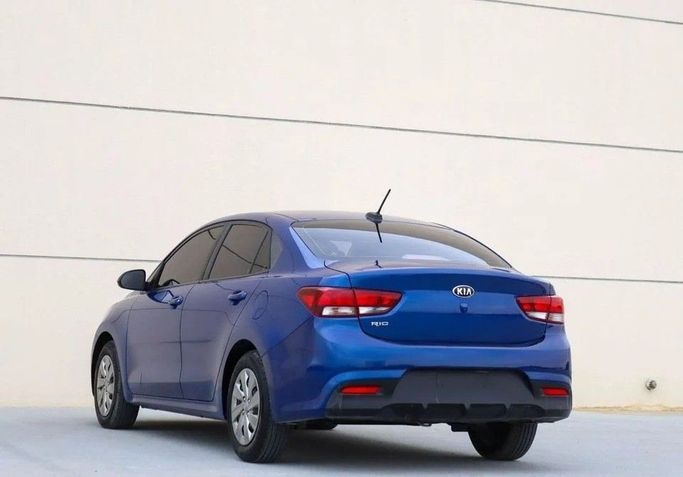 Подержанный Kia Rio IV (Global market), 1.4 л, 2020 в Шардже от Al Sayed Khamis Used Cars Синий цвет. GCC | AUTO.AE