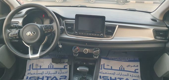Новый Kia Rio IV Рестайлинг, 1.6 л, 2021 в Шардже от Ishtar Used Cars Белый цвет. GCC | AUTO.AE